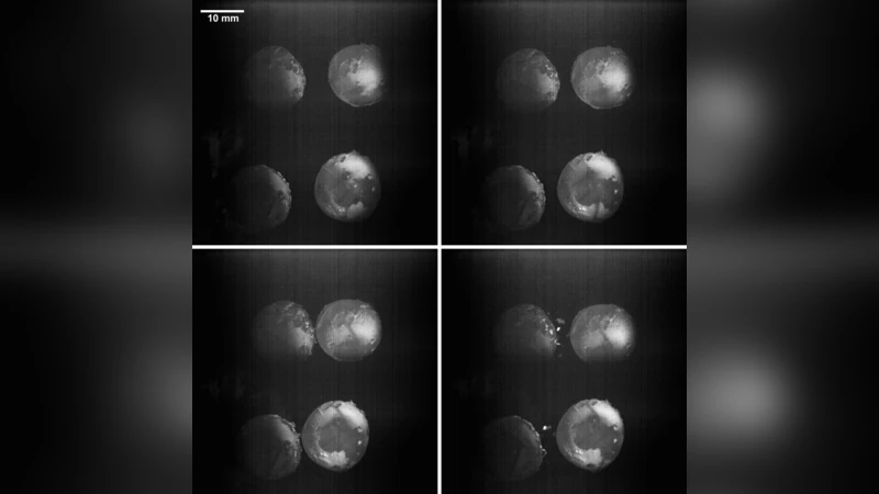 Microgravity experiments on the collisional behavior of Saturnian ring   particles