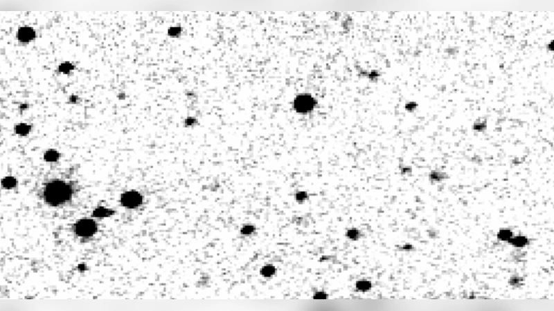 SN 2008iy: An Unusual Type IIn Supernova with an Enduring 400 Day Rise   Time