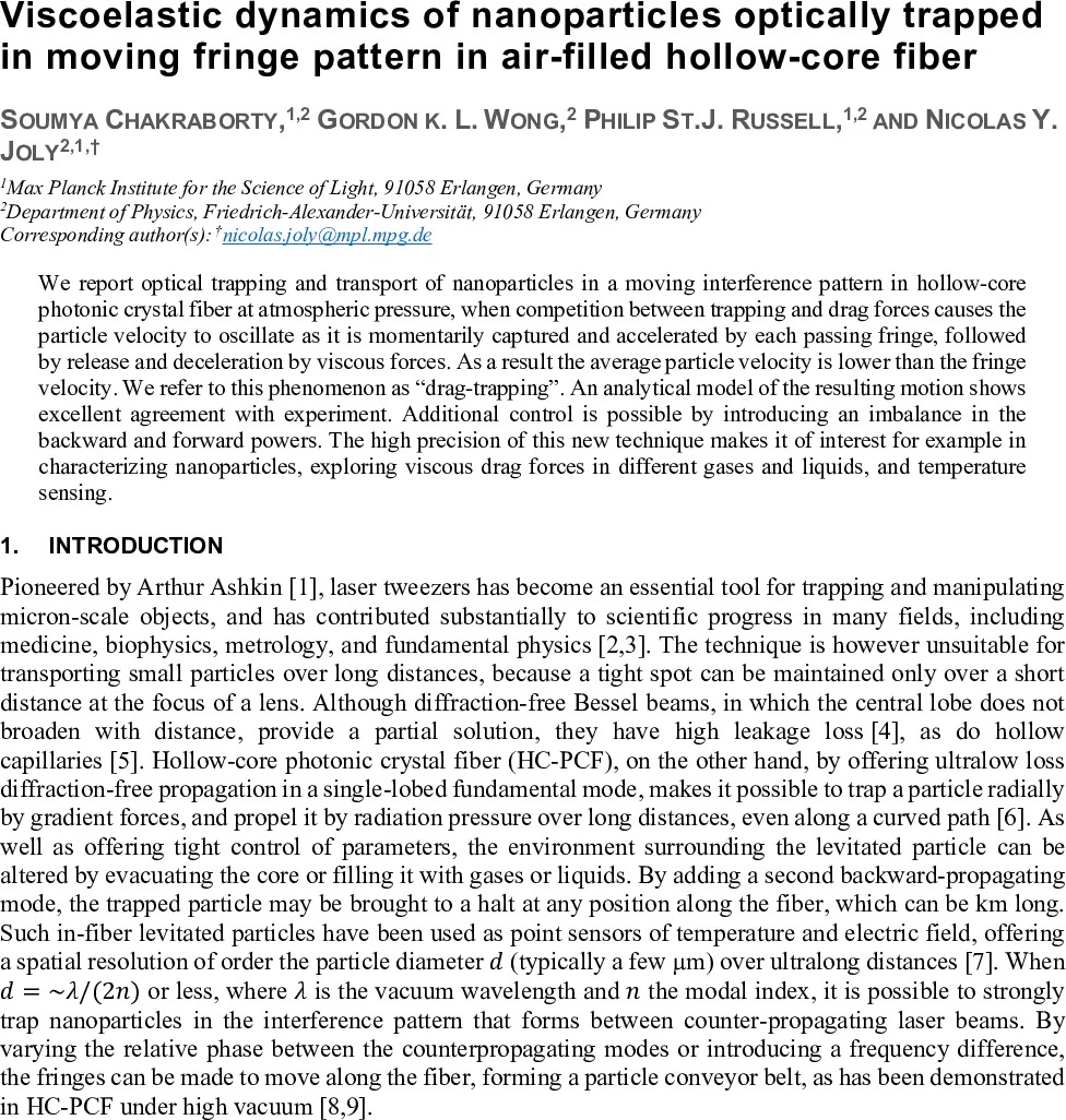 Viscoelastic dynamics of nanoparticles optically trapped in moving fringe pattern in air-filled hollow-core fiber