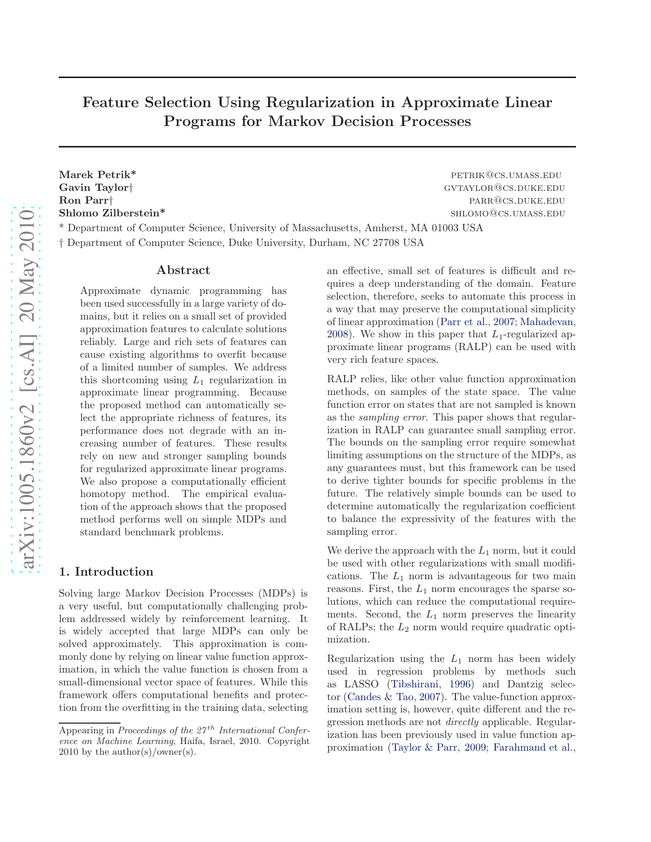 Feature Selection Using Regularization in Approximate Linear Programs   for Markov Decision Processes